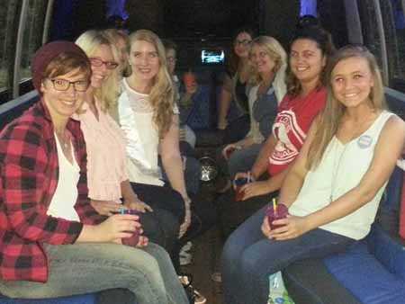 A bachelorette party taking the limo bus to St. Louis.