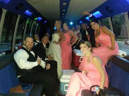 Charter limo bus for a St. Louis wedding party.