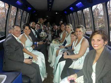 A wedding party relaxing on the bus in Washington, Missouri.
